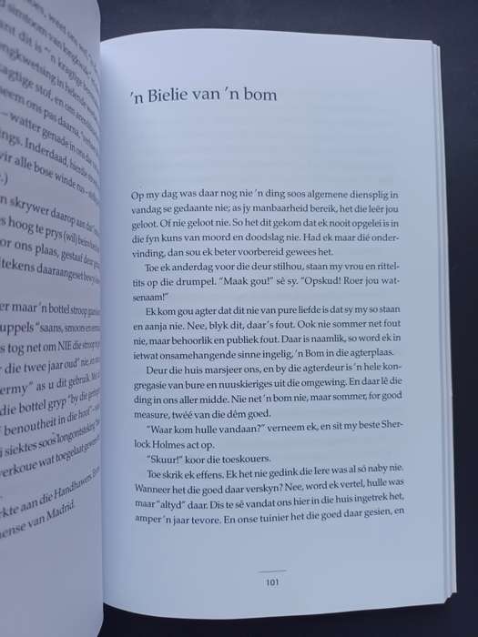 Met `n glimlag / Andre P. Brink