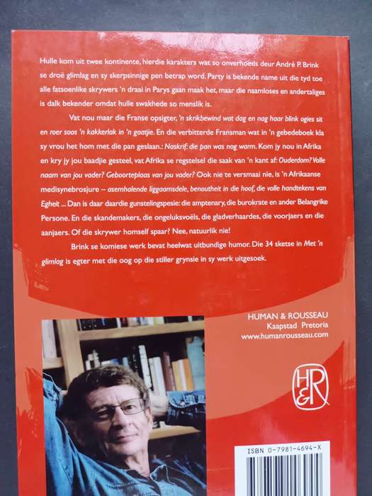 Met `n glimlag / Andre P. Brink