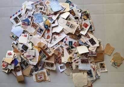 Plastic packet of Worldwide and RSA stamps - refer to photos