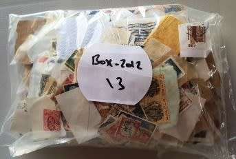 Plastic packet of Worldwide and RSA stamps - refer to photos