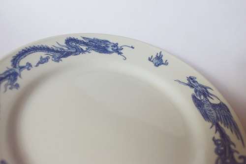 Vintage blue and white Oriental Chinese porcelain dish w dragon and phoenix flaming pearl 1960s