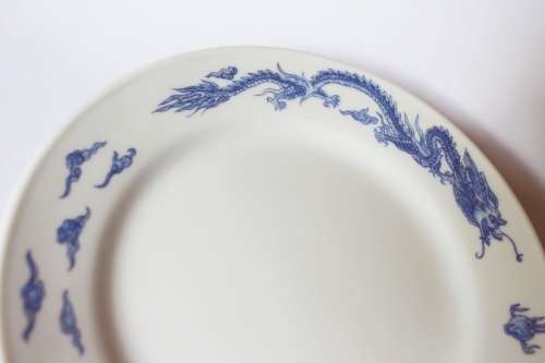 Vintage blue and white Oriental Chinese porcelain dish w dragon and phoenix flaming pearl 1960s