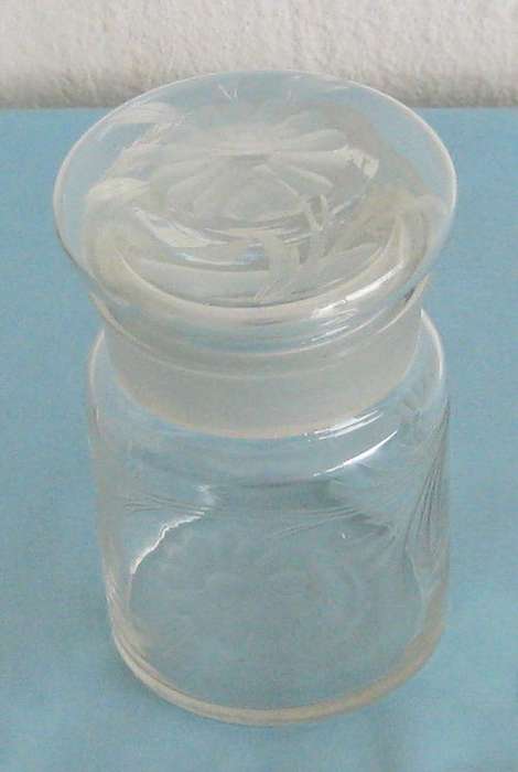 LIDDED GLASS JAR WITH INTRICATE FLOWER DESIGN