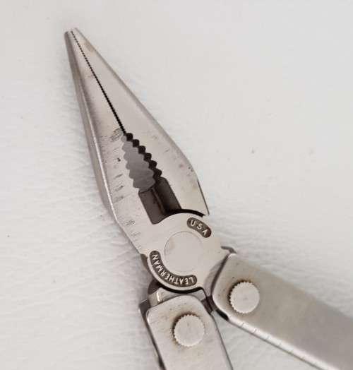 Leatherman Multi tool in pouch as per photo