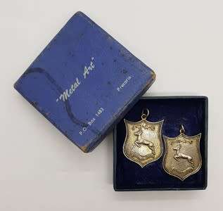 Set of 2 Silver Springbok medals commemorating Jackie Gibson for relay in 1949 in original box app