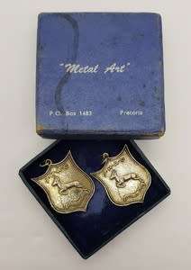 Set of 2 Silver Springbok medals commemorating Jackie Gibson for relay in 1949 in original box app