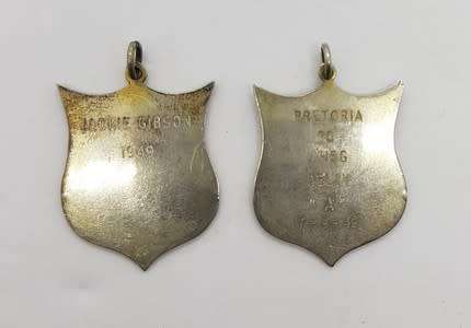 Set of 2 Silver Springbok medals commemorating Jackie Gibson for relay in 1949 in original box app