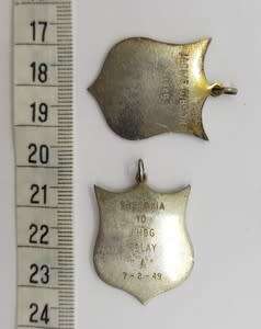 Set of 2 Silver Springbok medals commemorating Jackie Gibson for relay in 1949 in original box app