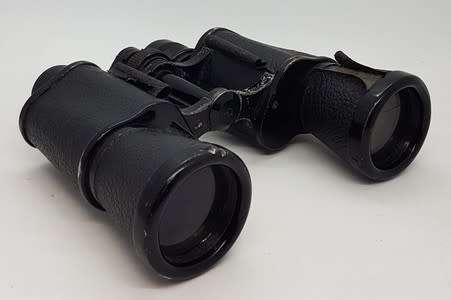 Pair of 8x binoculars made by Oigestart as per photo