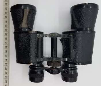 Pair of 8x binoculars made by Oigestart as per photo