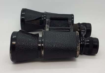 Pair of 8x binoculars made by Oigestart as per photo
