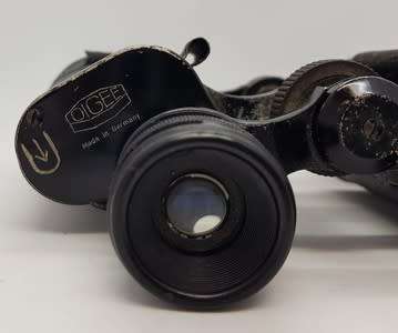 Pair of 8x binoculars made by Oigestart as per photo