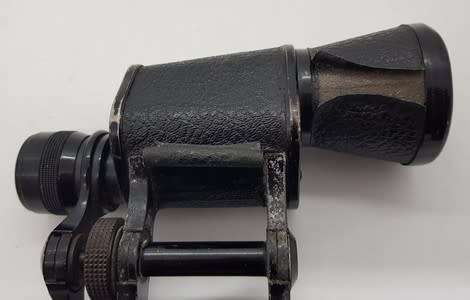 Pair of 8x binoculars made by Oigestart as per photo