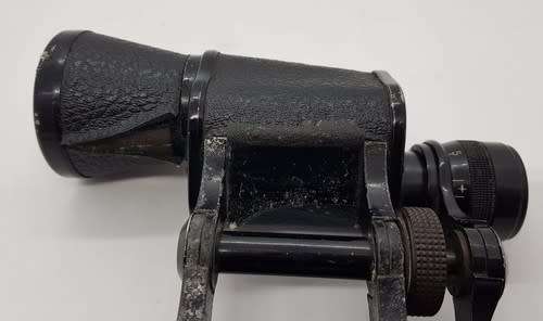 Pair of 8x binoculars made by Oigestart as per photo