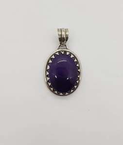 Sterling Silver vintage pendant with purple stone as per photo