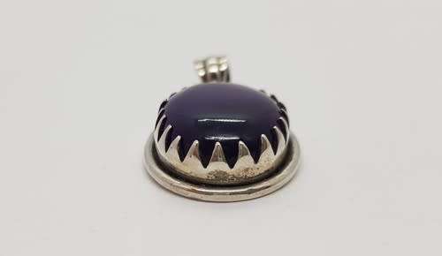 Sterling Silver vintage pendant with purple stone as per photo