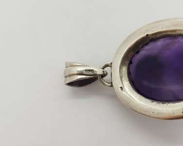 Sterling Silver vintage pendant with purple stone as per photo