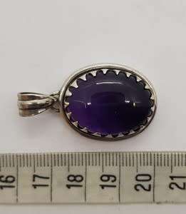 Sterling Silver vintage pendant with purple stone as per photo