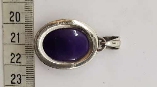Sterling Silver vintage pendant with purple stone as per photo