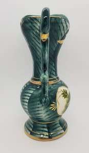 Pair of handpainted porcelain jugs height 20cm as per photo