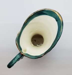 Pair of handpainted porcelain jugs height 20cm as per photo