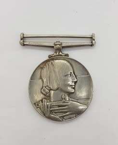 Silver Voluntary Medical Service medal issued to G. Moller for 15 years service - as per scan