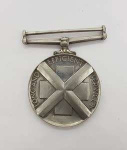 Silver Voluntary Medical Service medal issued to G. Moller for 15 years service - as per scan