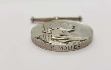 Silver Voluntary Medical Service medal issued to G. Moller for 15 years service - as per scan