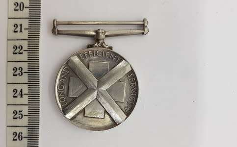 Silver Voluntary Medical Service medal issued to G. Moller for 15 years service - as per scan