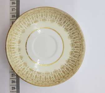 Small Wedgwood cup and saucer (chipped) - as per photo