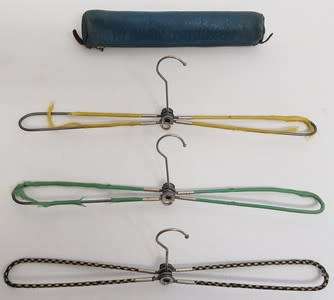 Set of 3 fold up hangers in leather travel bag - as per photo