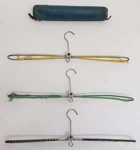 Set of 3 fold up hangers in leather travel bag - as per photo