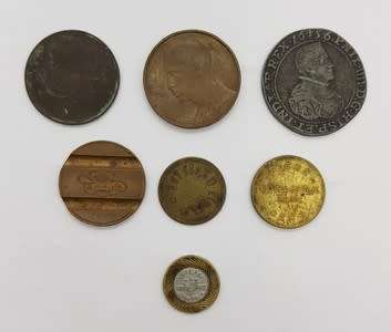 Lot of 7 different tokens as per photo