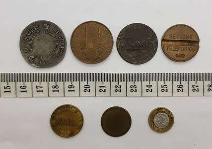 Lot of 7 different tokens as per photo