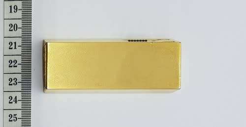 Electronic Ronson lighter shaped as a gold bar - as per photo