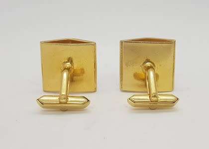 Pair of gold coloured cufflinks - as per photo