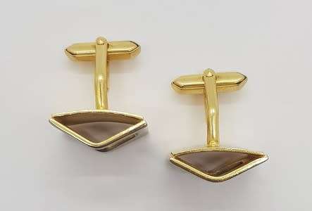 Pair of gold coloured cufflinks - as per photo