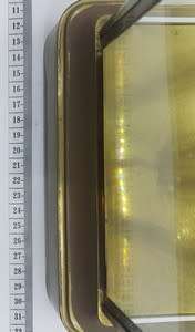 Antique French mantel clock with brass and glass casing - some damage to face and glass - no bell