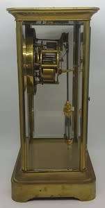 Antique French mantel clock with brass and glass casing - some damage to face and glass - no bell