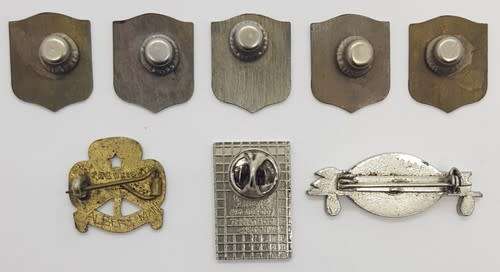 Lot of 8 different badges - as per scan
