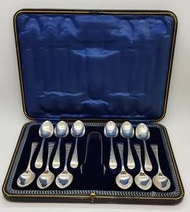 Set of 12 Hallmark Silver spoons and sugar tongs in box- as per photo