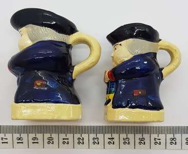 Pair of miniature character jugs - as per photo