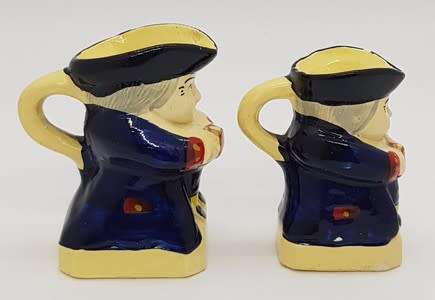 Pair of miniature character jugs - as per photo