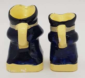 Pair of miniature character jugs - as per photo