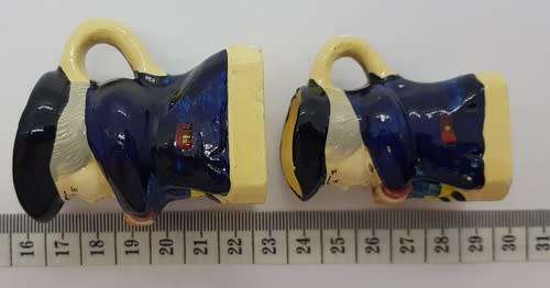 Pair of miniature character jugs - as per photo