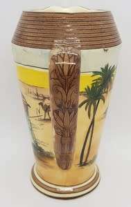 Royal Doulton `Desert scene` jug with hairline crack - as per photo