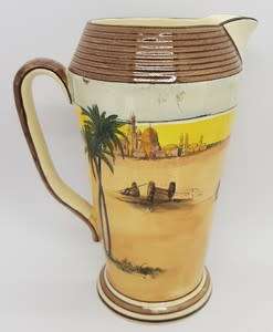 Royal Doulton `Desert scene` jug with hairline crack - as per photo