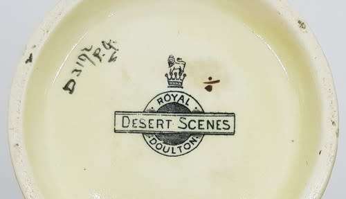 Royal Doulton `Desert scene` jug with hairline crack - as per photo