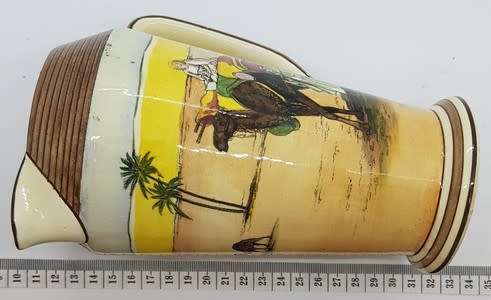 Royal Doulton `Desert scene` jug with hairline crack - as per photo