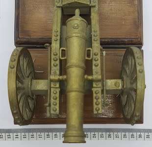 Plastic Model Canon on wooden stand - as per photo